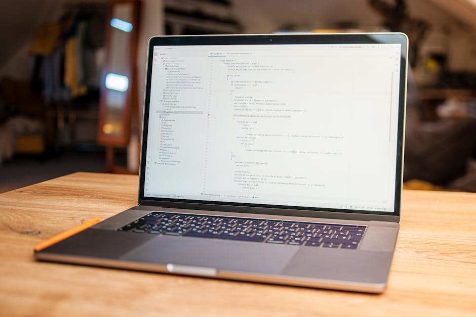 The image displays a close-up of a computer screen showing lines of code in a text editor. The code consists of HTML and CSS markup with various tags and attributes, including class labels, image sour